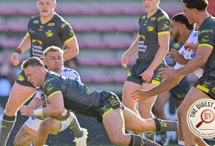 Rhinos Dodge French Disaster to Reclaim Super League Summit